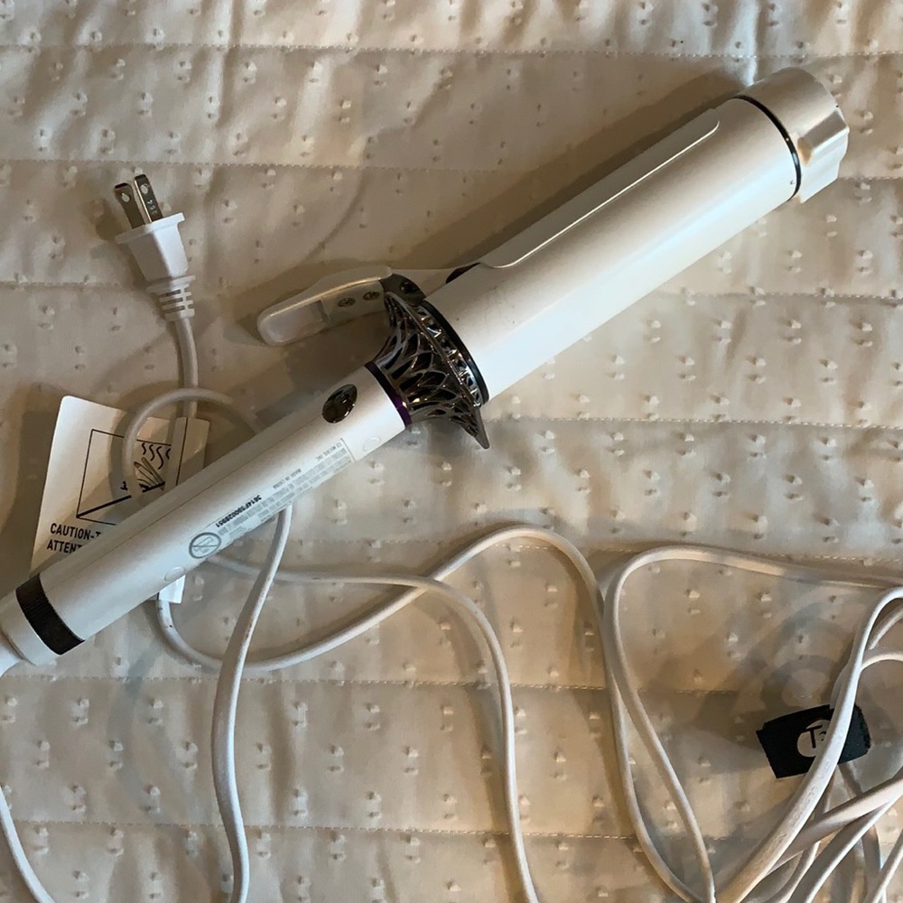 Gently used T3 curling iron. 1 3/4 inch.